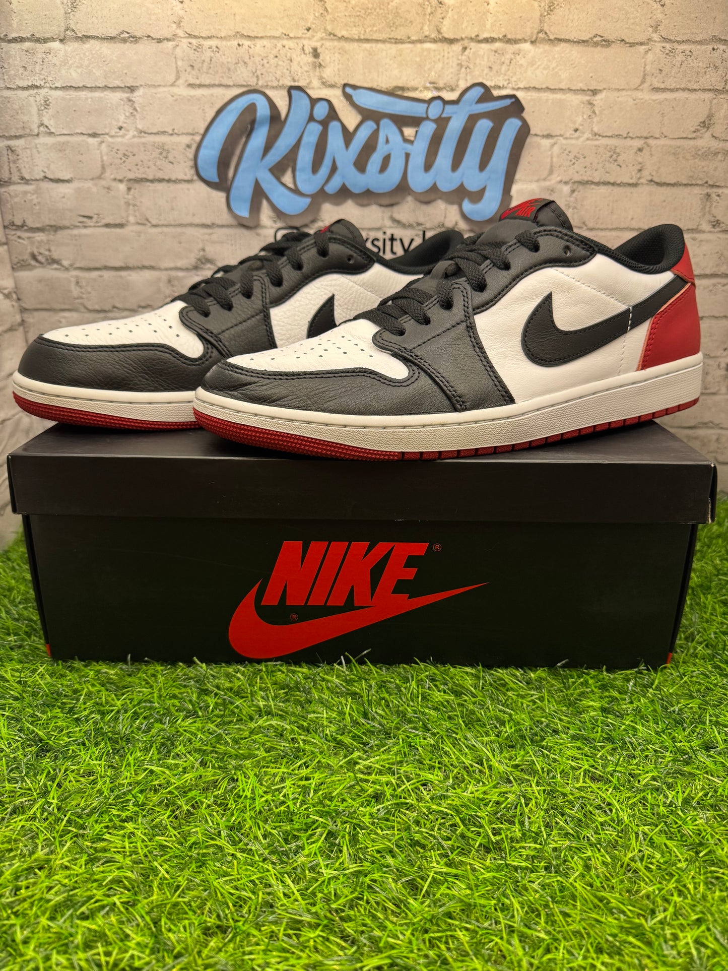Jordan 1 Low Black Toe PO 12